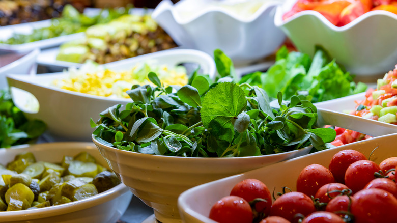 Salad bar ingredients in bowls