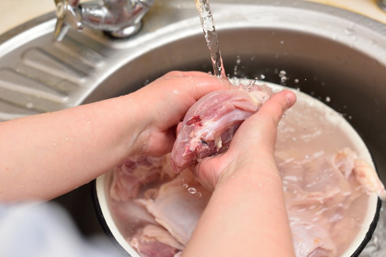 washing chicken