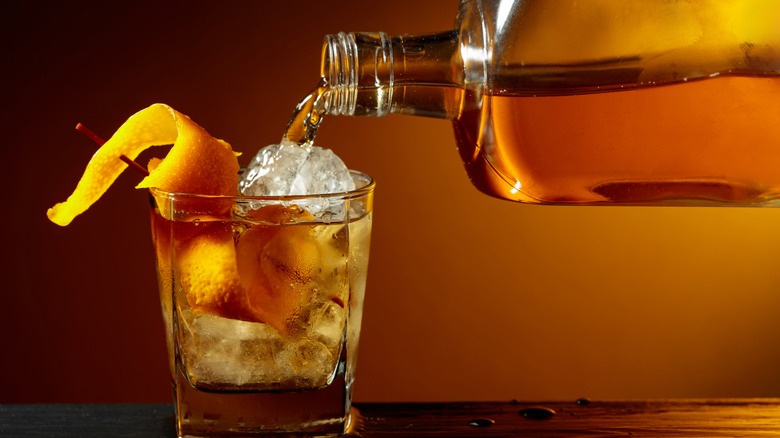 Bourbon being poured into a glass