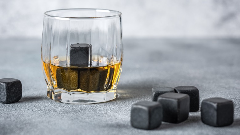 Glass of whiskey, with whiskey stones