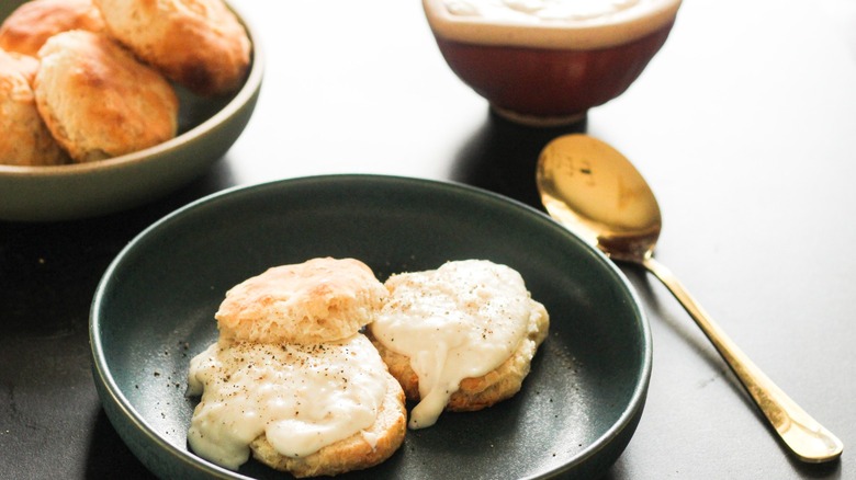 gravy on biscuits with spoon 