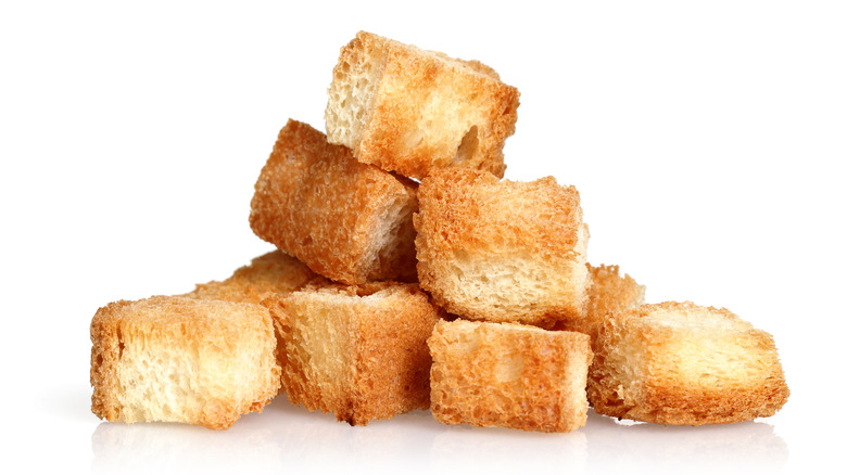 Pile of croutons isolated on white