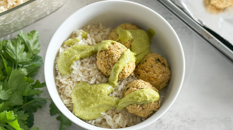 baked falafel patties on baking sheet