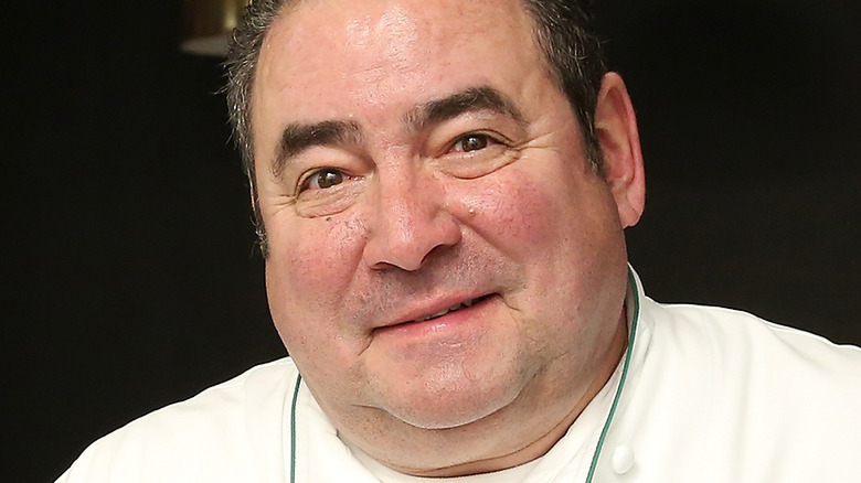 Emeril Lagasse in white chef suit