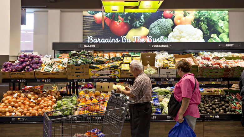 Two shoppers inside Aldi