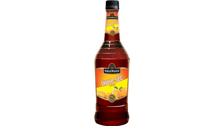 Bottle of Hiram Walker triple sec on white background
