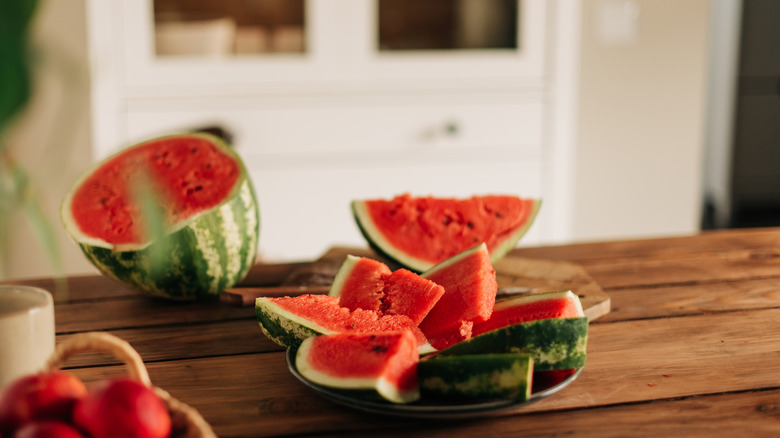 Watermelon sliced on counter