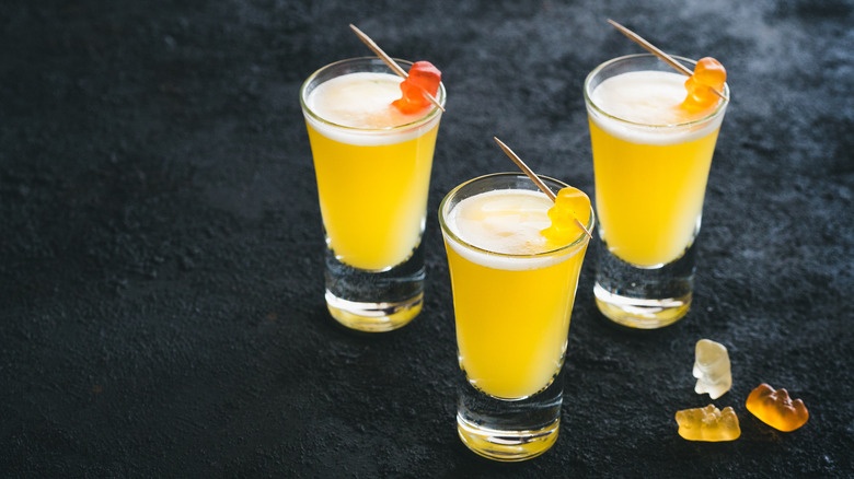 Gummy bear garnishes in lemon shot
