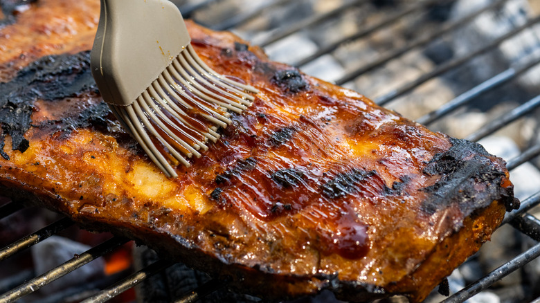 ribs brushed on grill