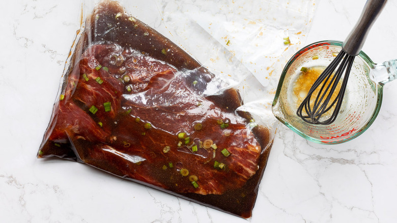 steak marinating in bag