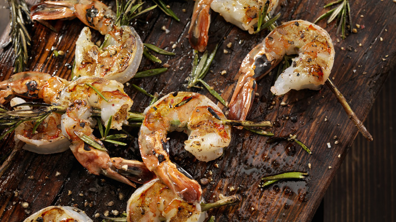 Crispy shrimp on wooden board