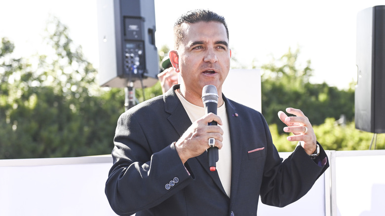 Buddy Valastro talking on stage
