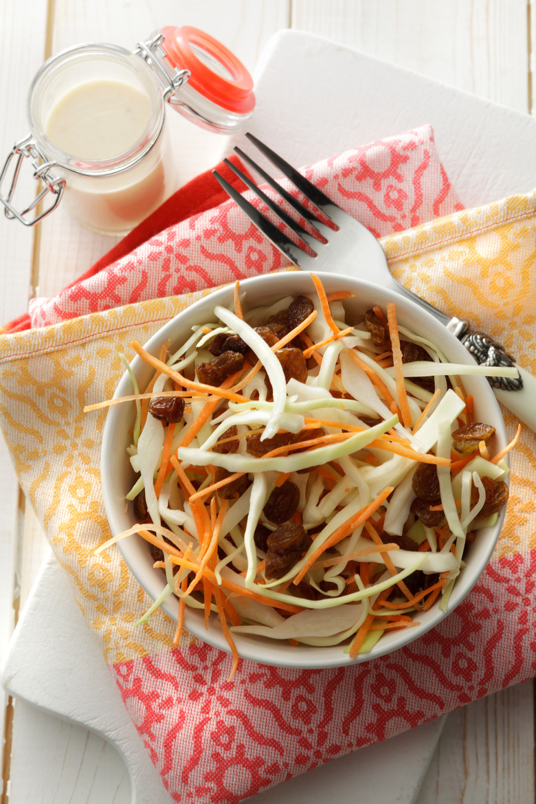 Cabbage Slaw With Raisins and Cranberries recipe - The Daily Meal
