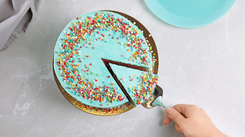 Cutting birthday cake