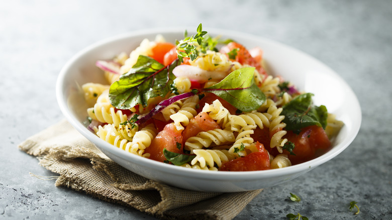 A bowl of pasta salad
