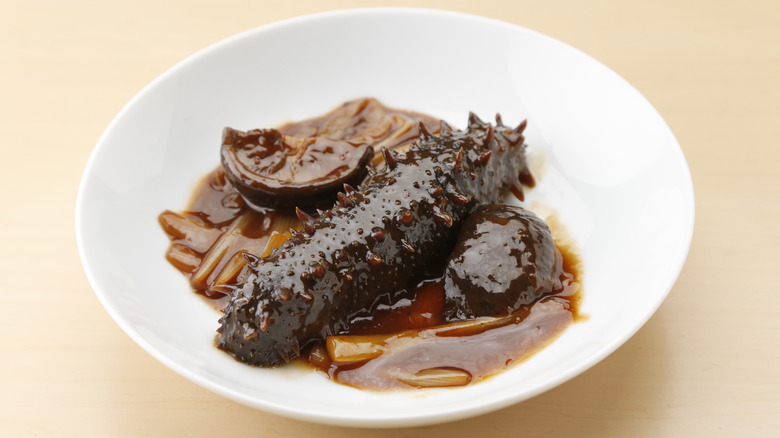 Sea cucumber stir fried in sauce 