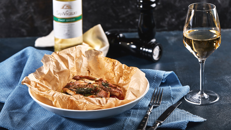 Fish with lemon in parchment paper