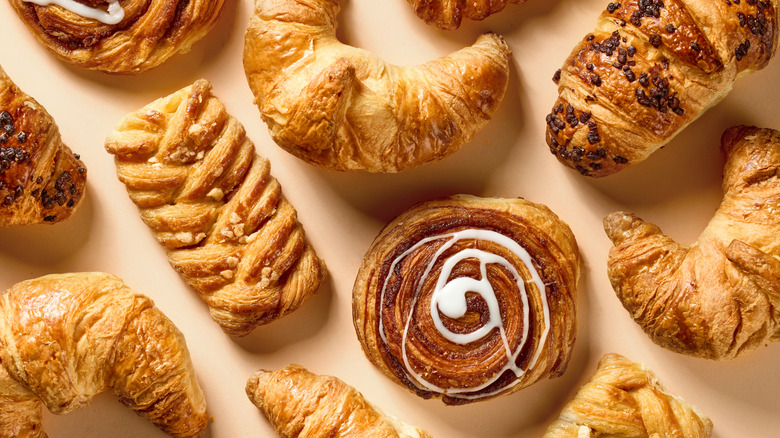 Variety of pastries on tan background