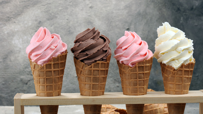 four cones of soft serve