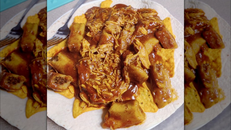 Tamale with tortilla chips and toppings