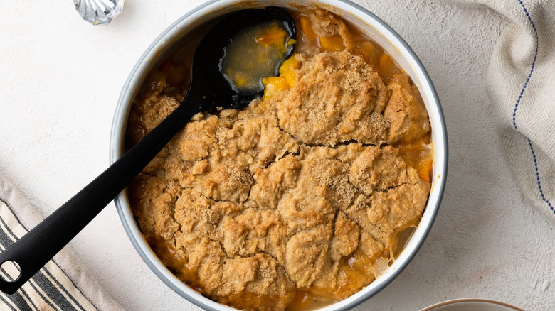 cardamom peach cobbler in dish