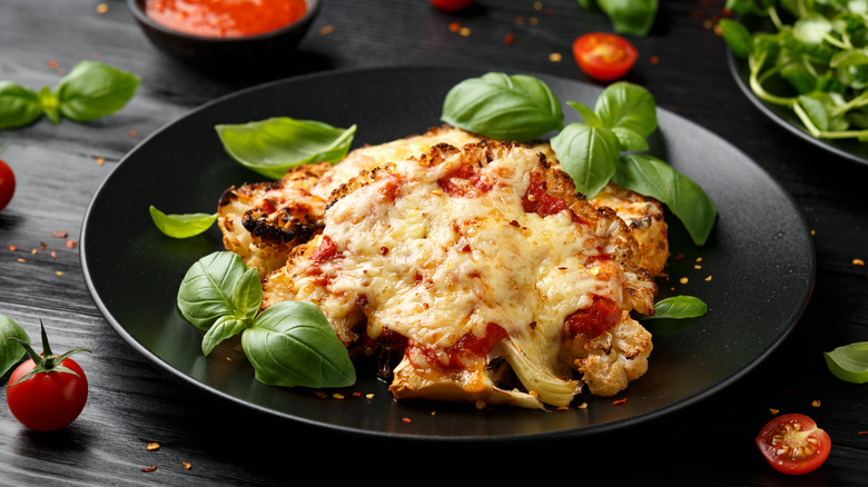 cauliflower parmesan steaks on plate
