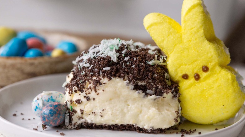 piece of dirt cake with peeps bunny on plate