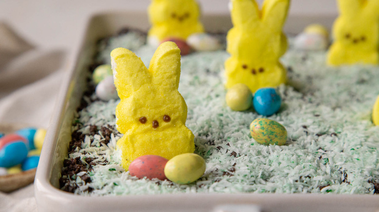 easter dirt cake with peeps bunnies and eggs on top
