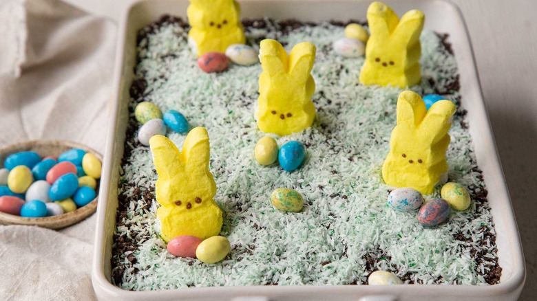 easter dirt cake with peeps bunnies and eggs on top