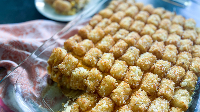 serving cheesy tater tots casserole 