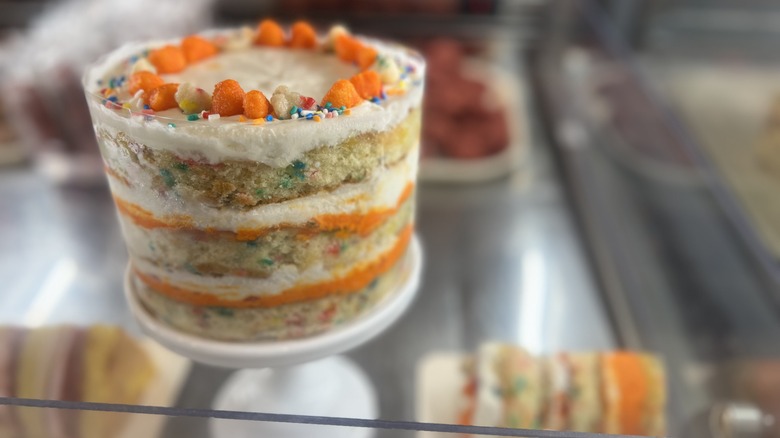 Cheetos cake in case 