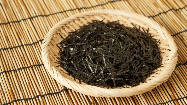 Plate of nori on thatched mat