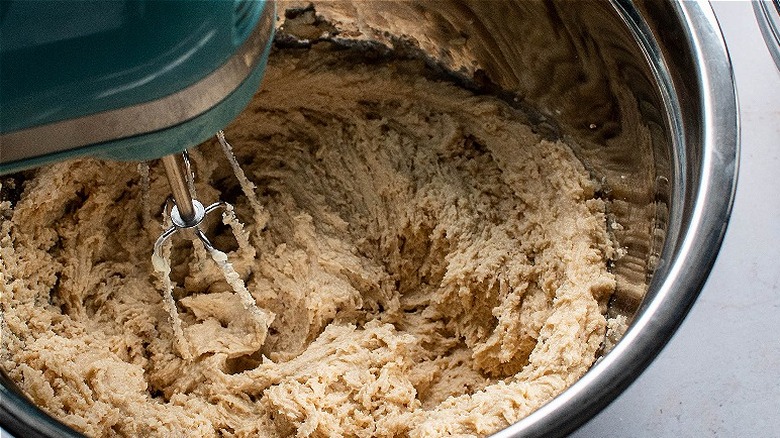 mixing butter and sugar in bowl