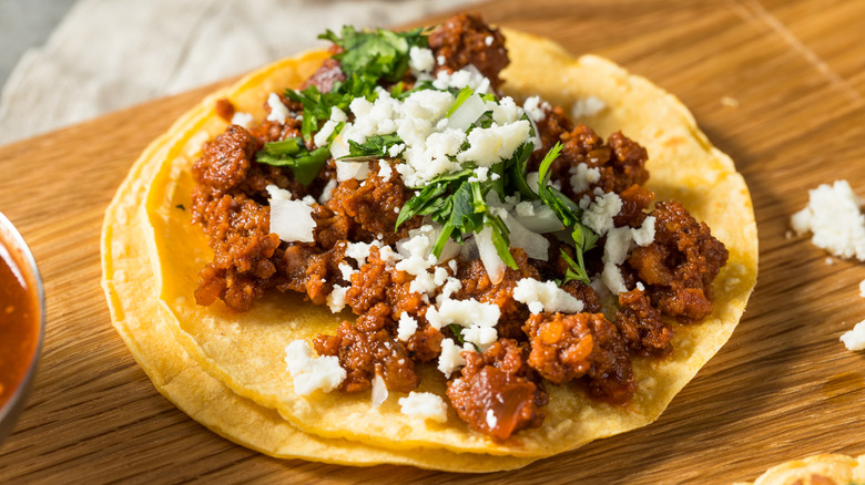 Chorizo taco on cutting board