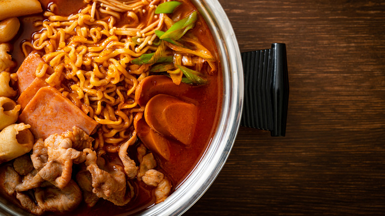Overhead view of a pot of budae jjigae