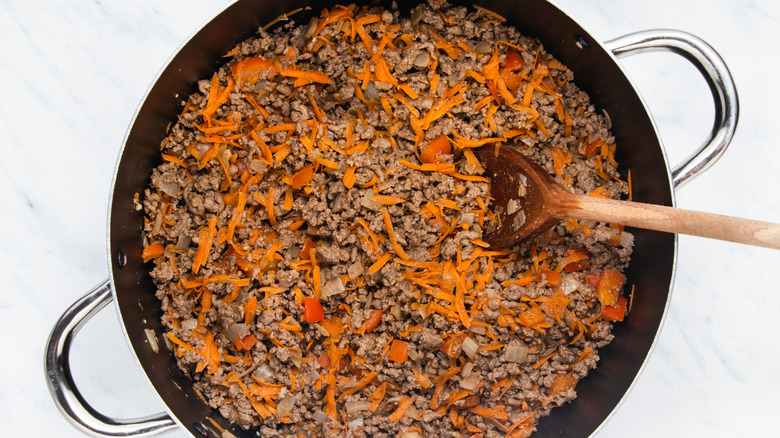 beef and veggies in pan 