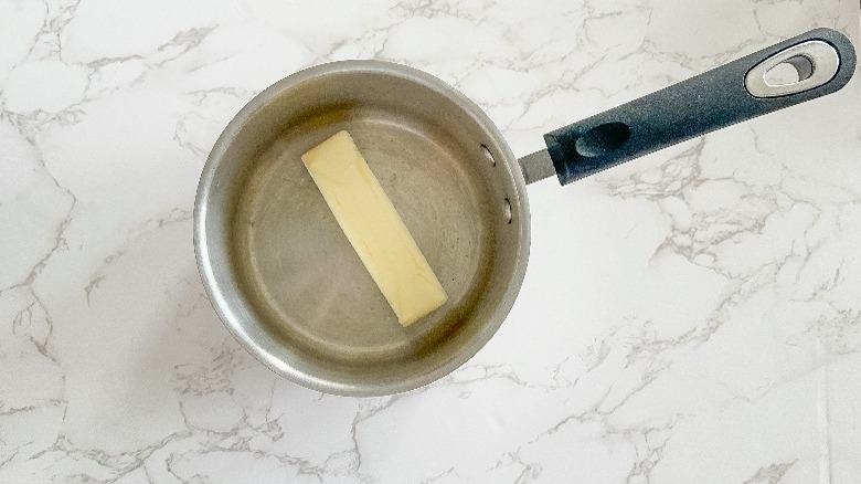 butter in saucepan