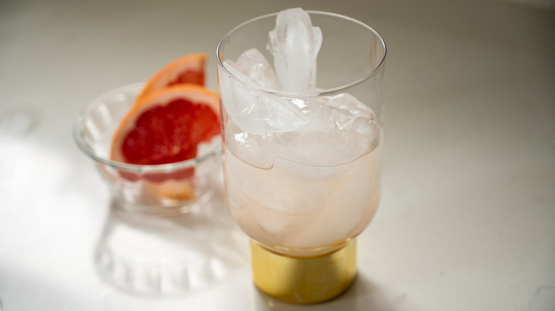 half-assembled cocktail in glass