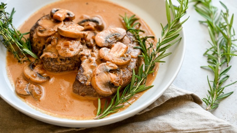 classic steak diane on plate