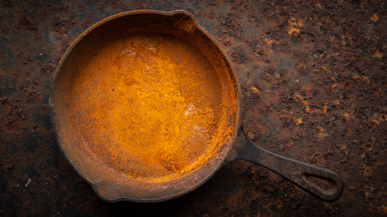 Rusty cast iron skillet