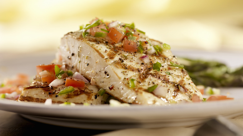 Cooked halibut with tomato topping