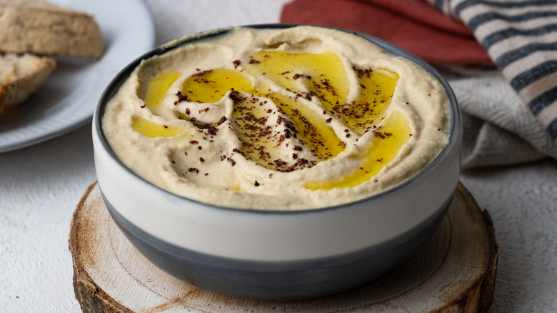 hummus in white bowl