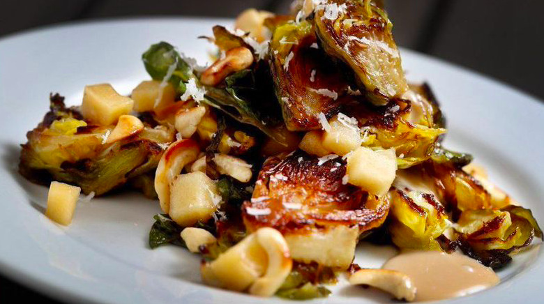 Crispy Brussels Sprouts With Roasted Apples recipe - The Daily Meal