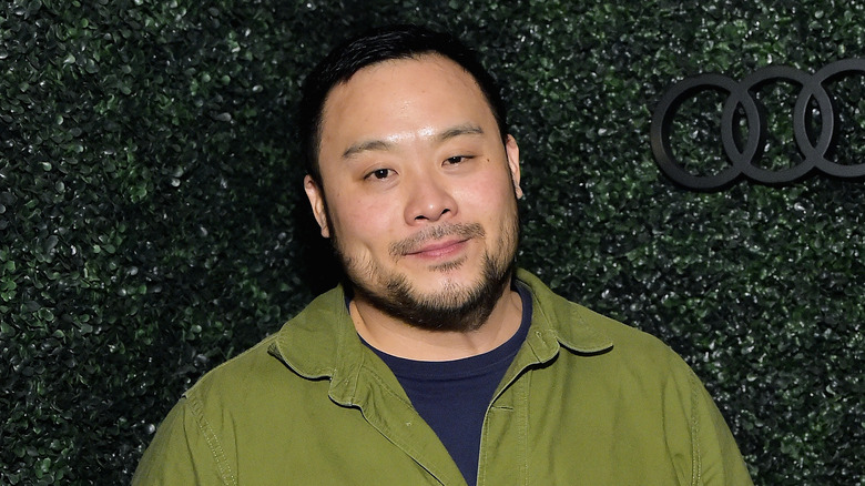 David Chang wearing green shirt