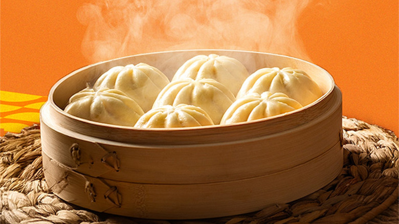 a box of frozen Chinese-style bbq pork bao against a white background