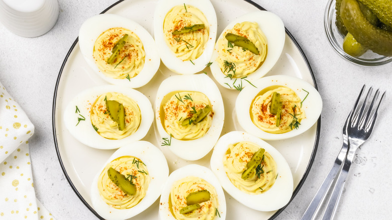 Deviled eggs garnished with pickle