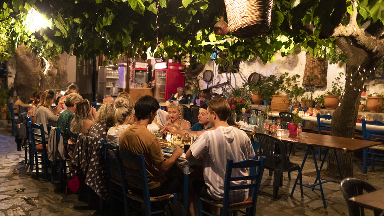 long table of al fresco diners