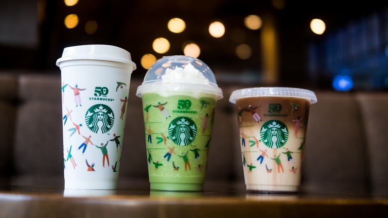 Three Starbucks drinks in different cups