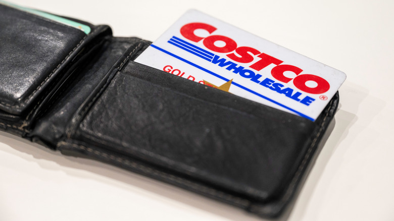 Open wallet with Costco membership card sticking out