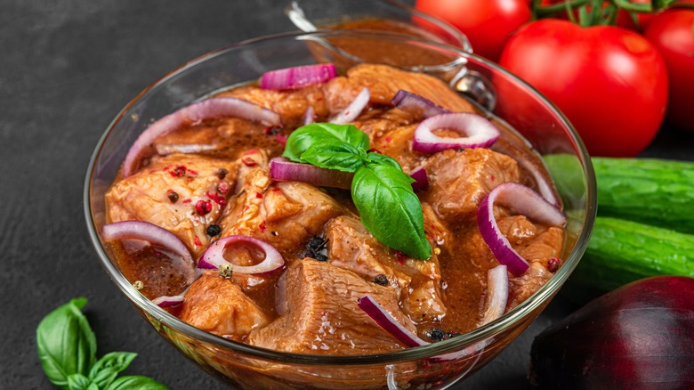 meat soaking in a marinade